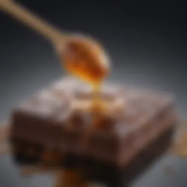 Artistic Drizzling of Honey on luscious Dark Chocolate Dark chocolate being drizzled with honey