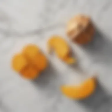 Golden Turmeric Root on Elegant Marble Turmeric root on a marble cutting board
